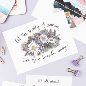 Colourful floral illustration with positive quote 'Let the beauty of your day take your breath away'