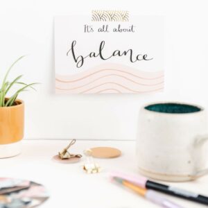 Printed postcard with hand lettering design reads 'It's all about balance'