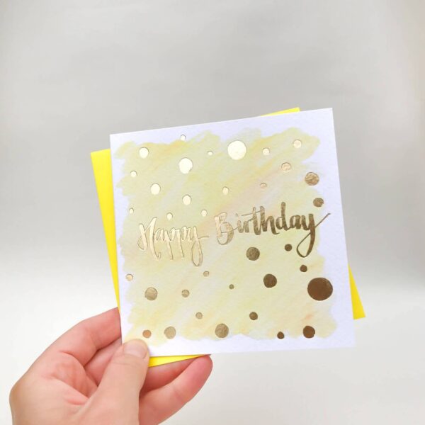 Yellow happy birthday card with luxury gold foil detail