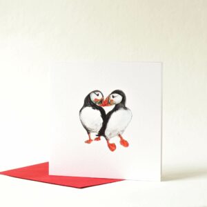 Printed card - two puffins touching beaks