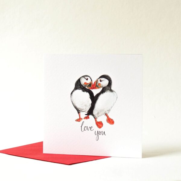 Printed card - two puffins touching beaks and text 'love you' beneath