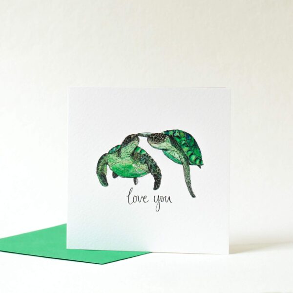 Printed card - two turtles swimming touching flipper to nose and 'love you' text printed beneath