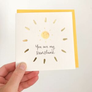 Greeting card - reads 'You are my sunshine' with sunshine design and gold foil detail
