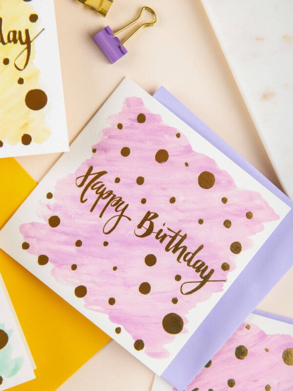 Colourful happy birthday card designs with simple polka dot design and gold foil detail