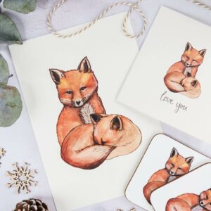 Selection of matching cute fox illustration gifts, including art print, coasters and card that reads 'love you' on the front.