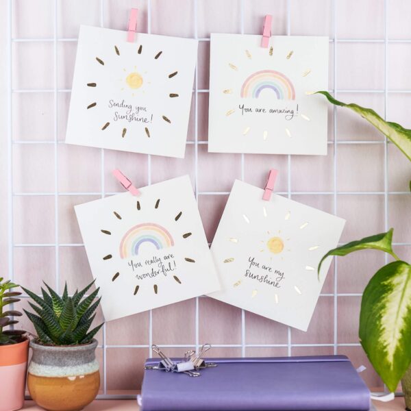 Positive greetings card designs with sunshines, rainbows, positive quotes and gold foil details