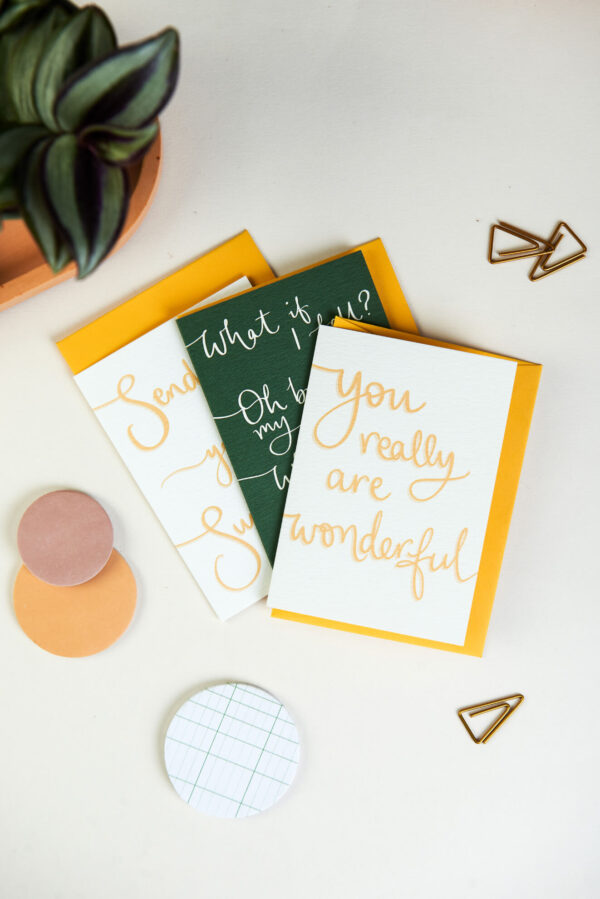 Positive notecards with uplifting hand lettered messages in green and yellow