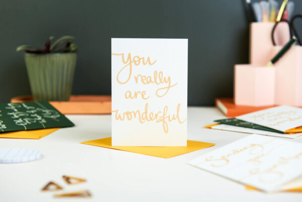 you really are wonderful, mini positive notecard on home desk