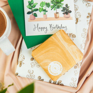 house plants birthday card with gift wrapped presents
