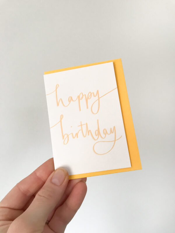 happy birthday mini notecard, in white with golden yellow text