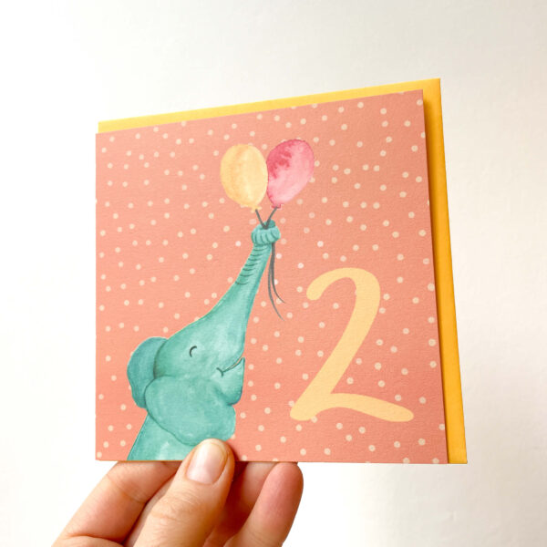 colourful 2nd birthday card with an elephant holding balloons