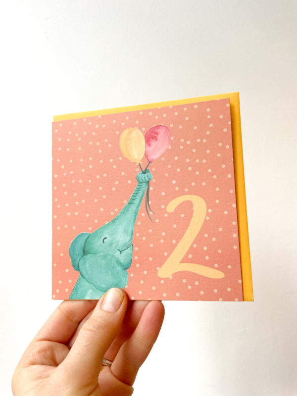 colourful 2nd birthday card with an elephant holding balloons