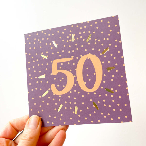 50th birthday card in purple and orange spotty design