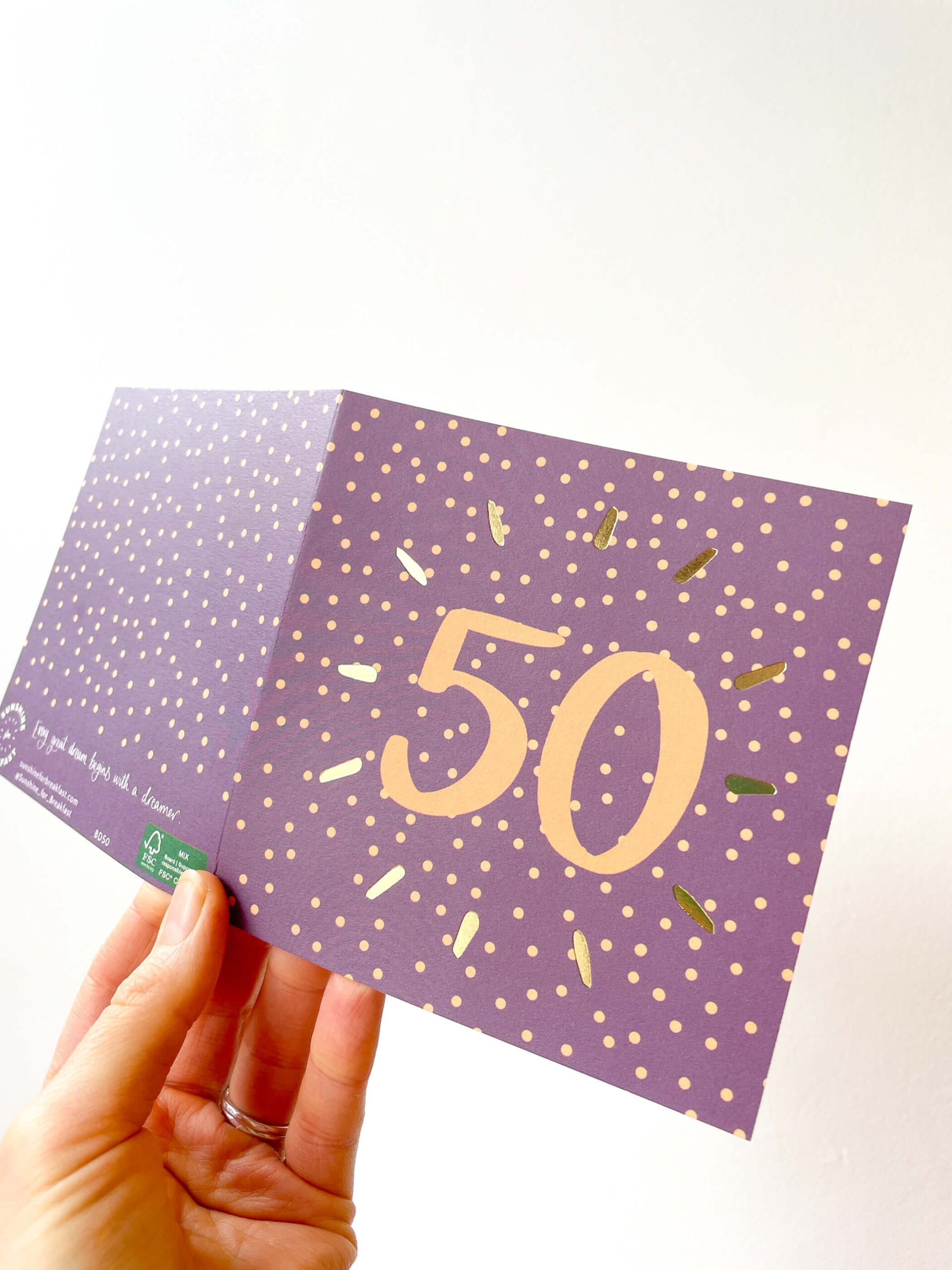 50th birthday card in purple and orange spotty design